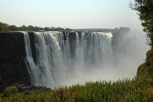 De Victoria Falls en de Zambezi tussen Zambia en Zimbabwe - Foto, afbeelding