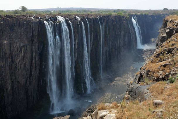 Οι καταρράκτες Victoria Falls και τον Ζαμβέζη, μεταξύ της Ζάμπια και της Ζιμπάμπουε - Φωτογραφία, εικόνα