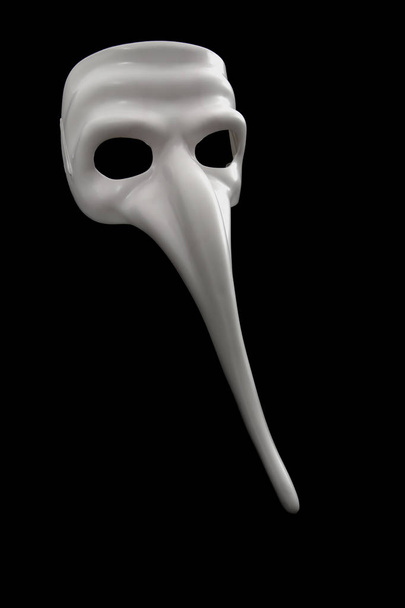 Maska s dlouhým nosem je izolována na černé - Fotografie, Obrázek