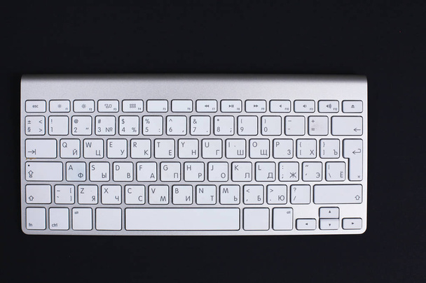 Modern aluminum keyboard on table in the office - Photo, Image