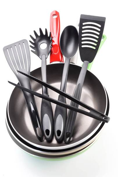 Pans and cooking abs cutlery on a white background - Photo, Image