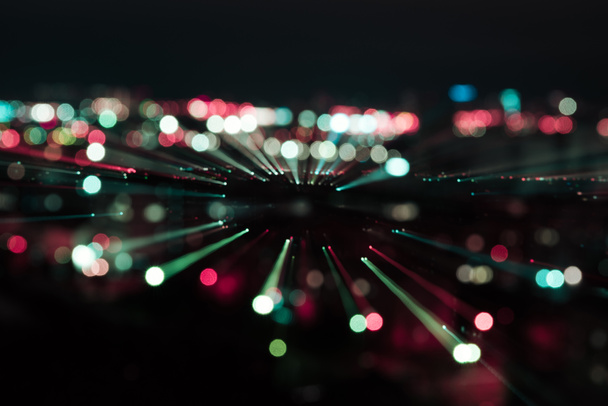 dark night background with colorful bokeh lights - Foto, afbeelding