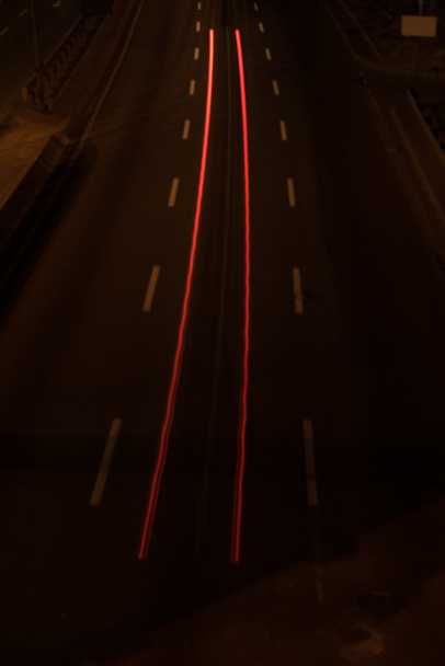 long exposure of road and shiny lights at night - Photo, Image