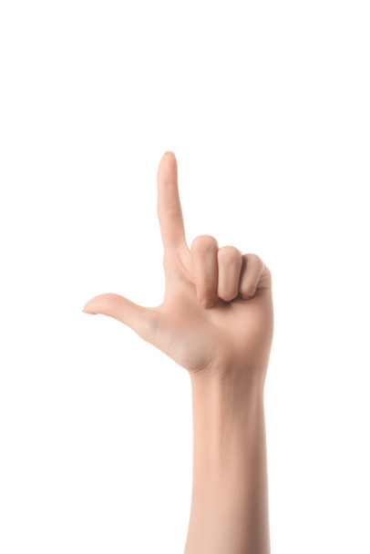 cropped view of woman pointing up with finger isolated on white - Photo, Image
