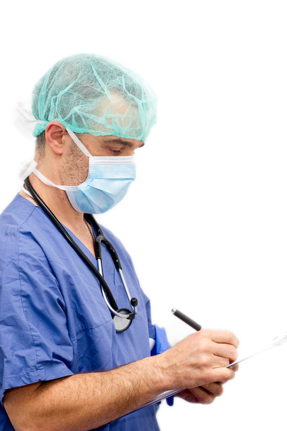 Medical professional. Closeup of nurse or doctor writing on clip - 写真・画像