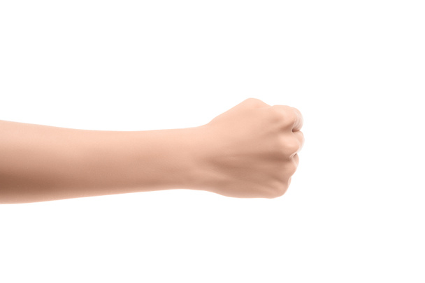 vista parcial de la mujer mostrando sí signo en lenguaje sordo y mudo aislado en blanco
 - Foto, Imagen