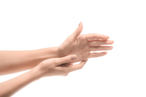 cropped view of woman hands touching isolated on white - Photo, Image