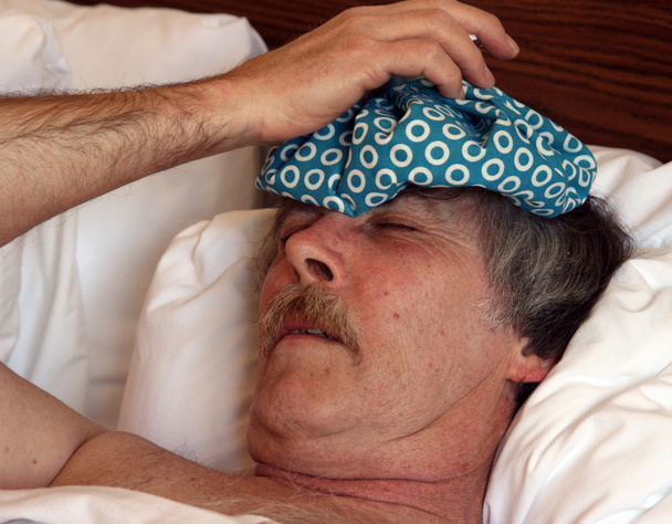 Man with a headache - Фото, изображение