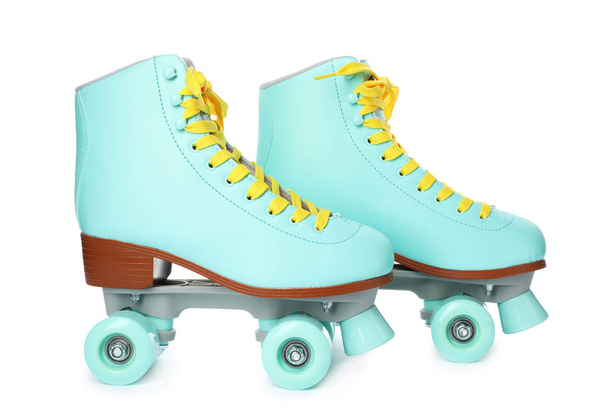 Pair of bright stylish roller skates on white background - Фото, зображення