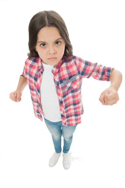 Stop bullying movement. Girl kid threatening with fist. Strong personality temper. Threaten with physical attack. Kids aggression concept. Aggressive girl threatening to beat. Threatening violence - Φωτογραφία, εικόνα