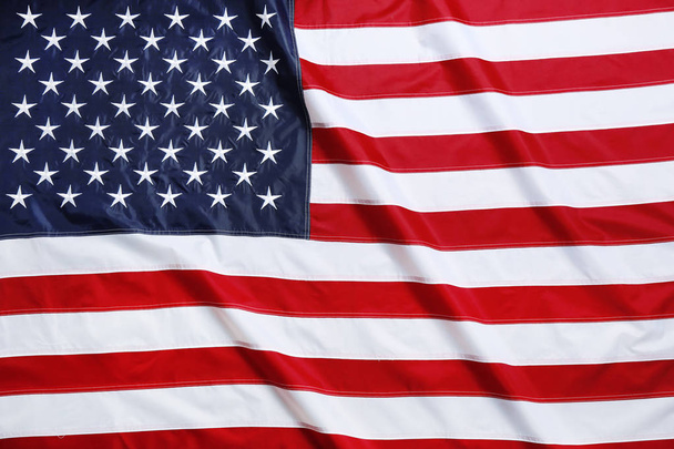 Американский флаг в качестве фона, вид сверху. Национальный символ США
 - Фото, изображение