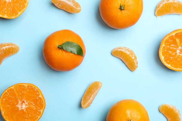 Composition with tangerines on color background, flat lay - Photo, image
