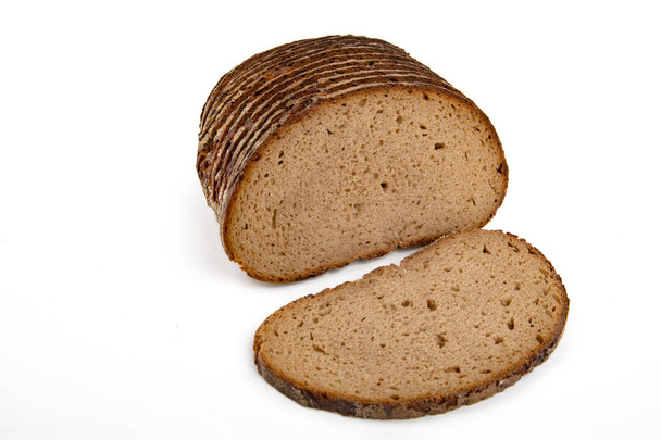 Slices of a rye Bread Loaf isolated on white background - Fotoğraf, Görsel
