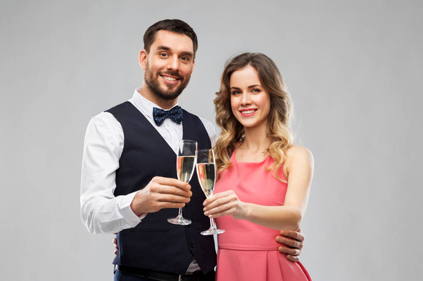happy couple with champagne glasses toasting - Fotoğraf, Görsel