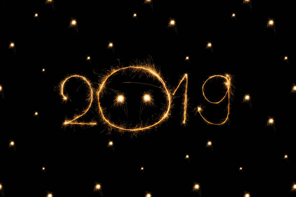 2019 and dots light sings on black background - Foto, Bild