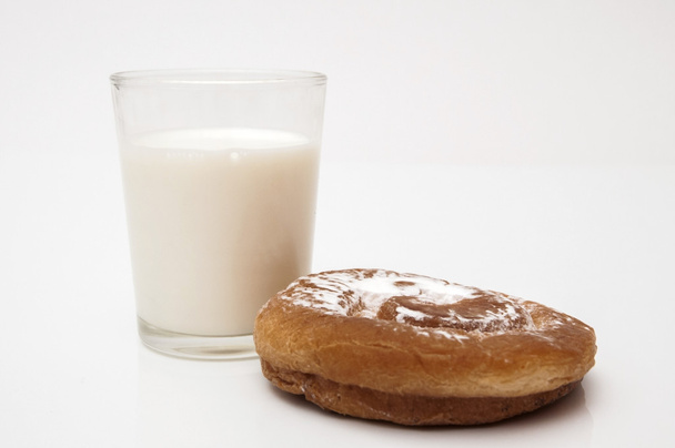glass of milk with sugar ensaimada - Photo, Image
