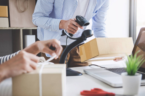 Shipment Online Sales, Small business or SME entrepreneur owner delivery service and working packing box, business owner working checking order to confirm before sending customer in post office. - Fotoğraf, Görsel