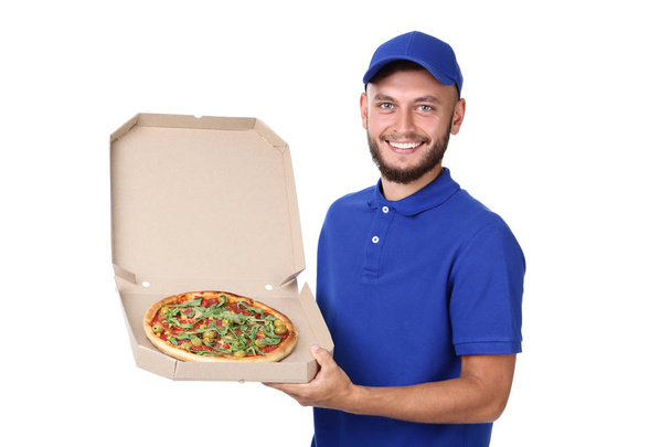 Delivery man with pizza in cardboard box isolated on white background - Photo, Image