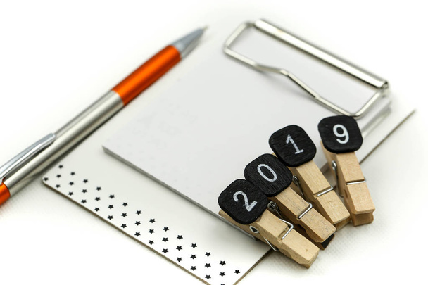 Text 2019 goals on notebook with pen on white background,New year Concept - Φωτογραφία, εικόνα