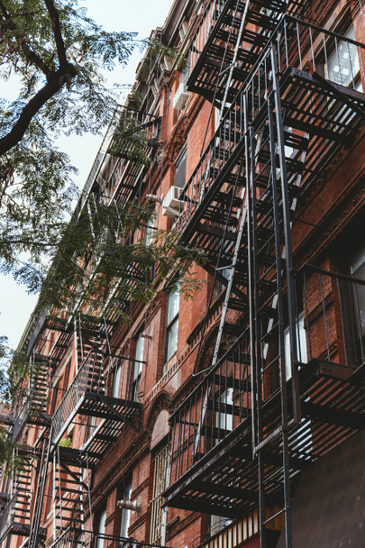 low angle view of old building in new york city, usa - 写真・画像