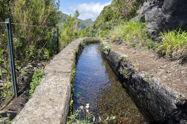 Levada das 25 fontes, irrigation canal detail view, touristic hiking trail, Rabacal, Madeira island, Portugal - Foto, immagini