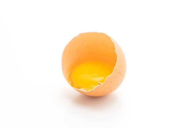 Cracked egg and shell isolated on white background - Zdjęcie, obraz