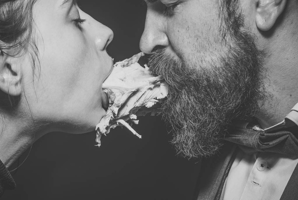 Couple enjoys meal, meat or fowl. Man and woman - Foto, imagen