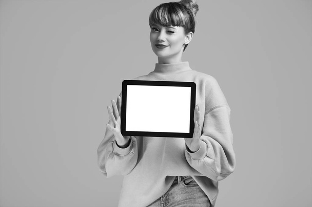 Portrait of beautiful glamour blond hipster woman with digital tablet. Studio shoot - Фото, зображення
