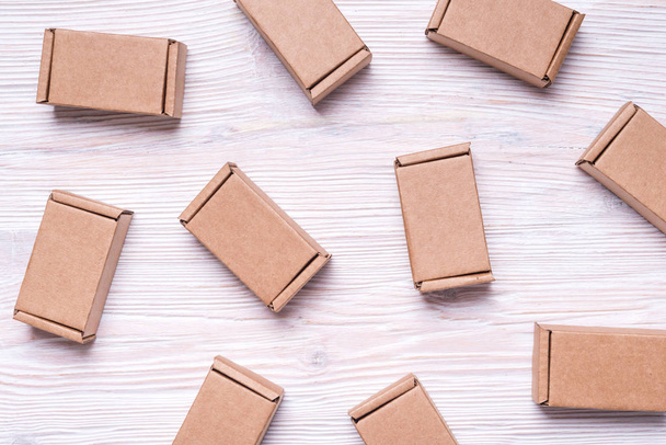 Set of cardboard boxes on wooden background - Photo, image