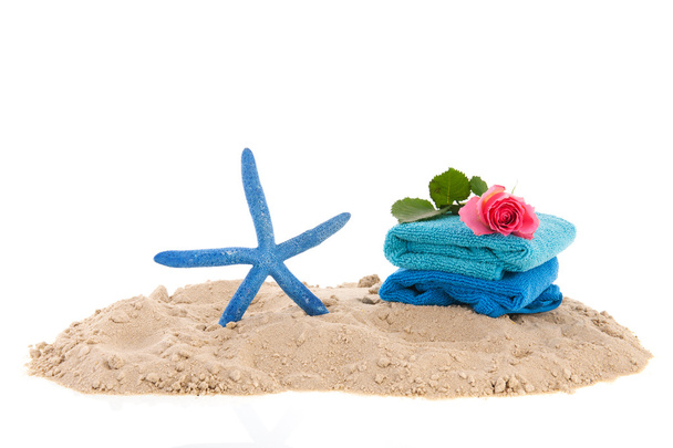 Towels and starfish at the beach - Fotoğraf, Görsel