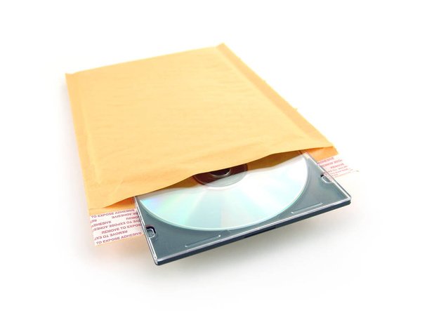 Studiová kopie disku CD-ROM ve žluté obálce  - Fotografie, Obrázek