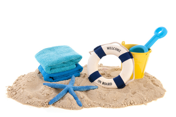 Towels and toys at the beach - Foto, Imagen