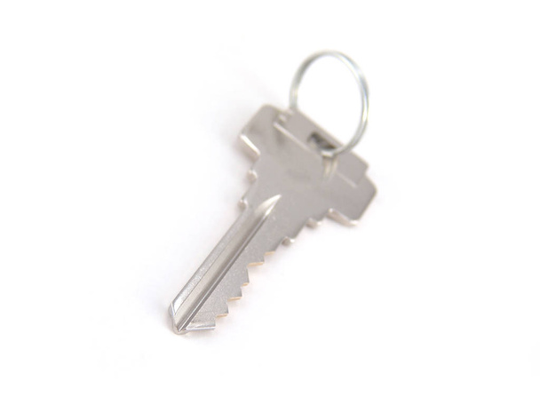 Close up image of key isolated on white background  - Photo, Image