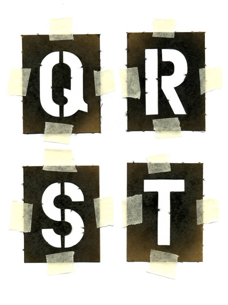картонные трафареты, прикрепленные к белой бумаге с помощью маскировочной ленты
 - Фото, изображение