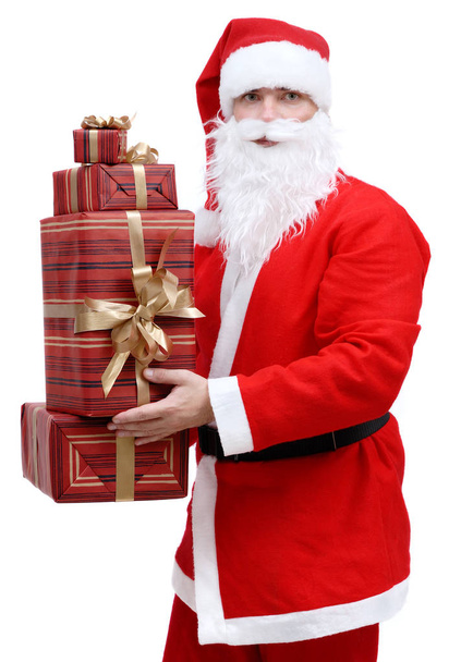 Santa Claus with Christmas gifts on a white background, isolated - Zdjęcie, obraz
