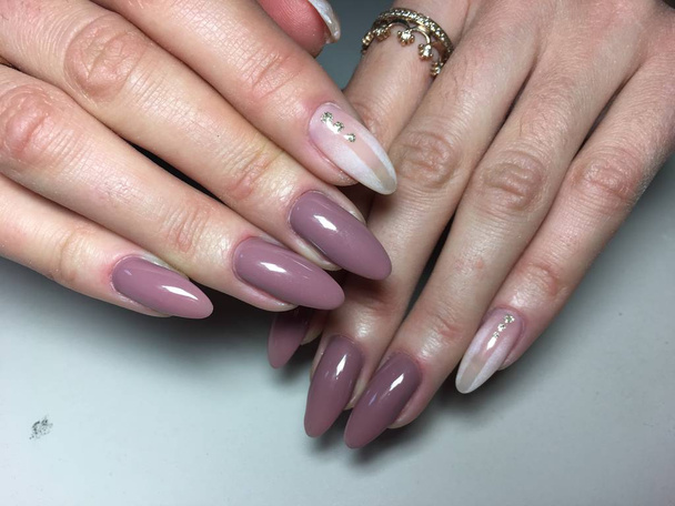 fashionable beige manicure with white gradient design - Photo, Image