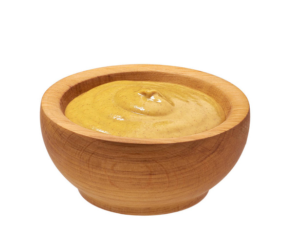 Fából készült bowl mustáros öntettel elszigetelt fehér background - Fotó, kép