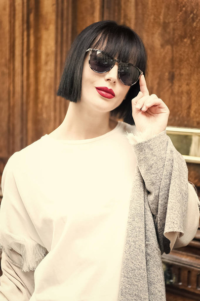 Woman with stylish short brunette hair and red lips. - Foto, Imagem