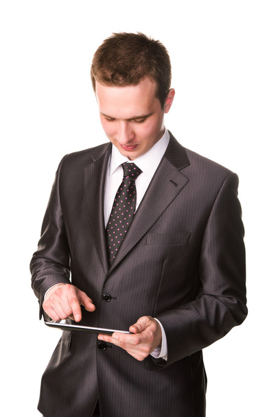 Young businessman working on a tablet pc comuter - Φωτογραφία, εικόνα