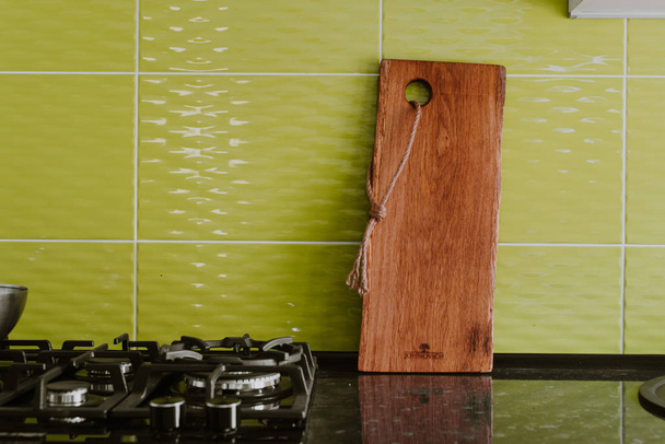 Oak cutting Board in kitchen interior - 写真・画像