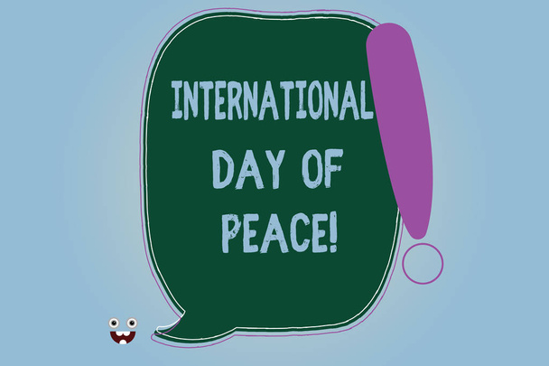 Word writing text International Day Of Peace. Business concept for Worldwide peaceful celebration Hope freedom Blank Color Speech Bubble Outlined with Exclamation Point Monster Face icon. - Photo, Image