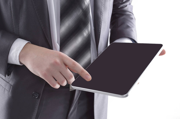 close up.businessman tapping the screen of the digital tablet - Photo, Image
