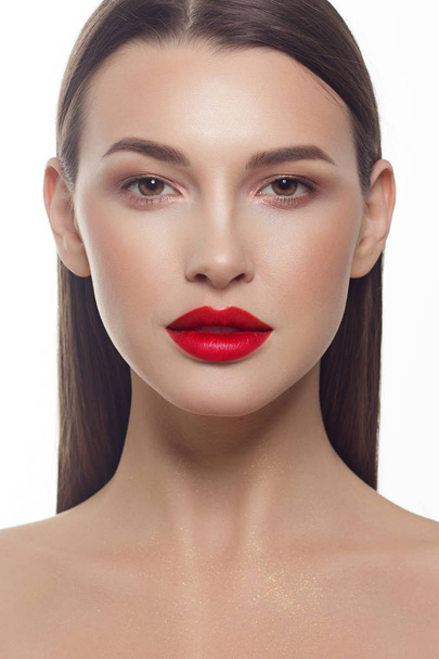 Close-up portrait of a beauty woman with full lips, straight hair and perfectly clean skin. Daytime makeup, styling and soft care. Skin care in the spa salon or cosmetology, smooth eyebrows - Fotografie, Obrázek