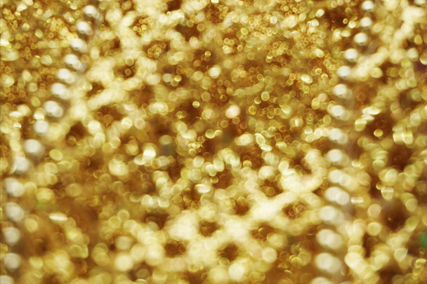Abstrakcyjny nieostry błyszczący błyszczący złoty brokat bokeh tło  - Zdjęcie, obraz