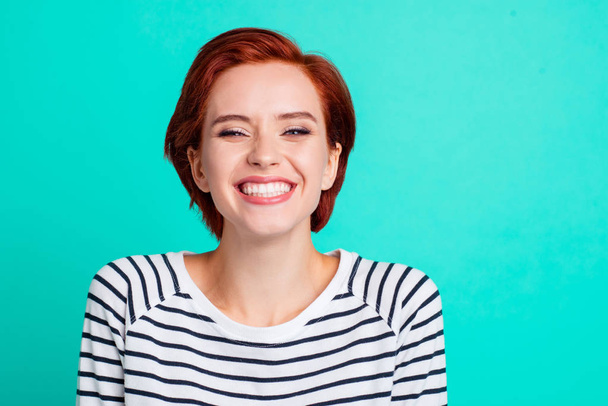 Close-up portrait of nice lovely charming attractive cheerful optimistic positive red lady wearing striped pullover isolated over bright vivid shine green turquoise background - Foto, Bild