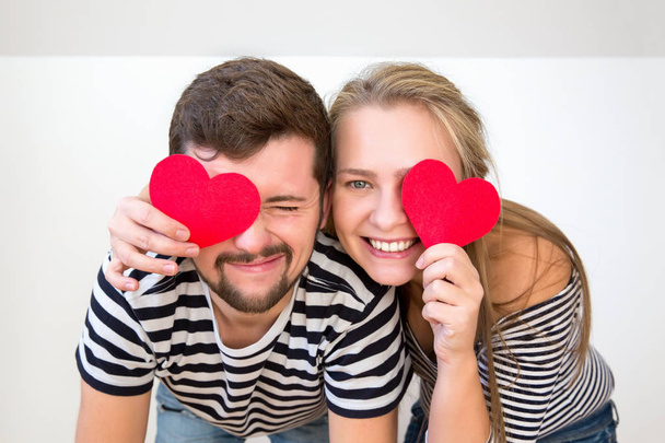 Funny young couple have fun on valentines day. Close up.  - 写真・画像