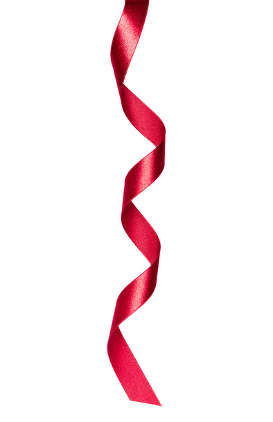 Shiny satin ribbon isolated on white background. - Foto, afbeelding