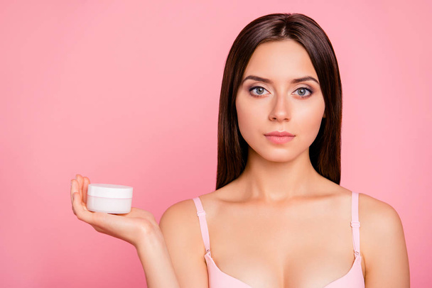 New gel ad. Close-up portrait of her she nice cute feminine attractive calm confident lady in beige bra demonstrating product on palm isolated over pink pastel background - Photo, image