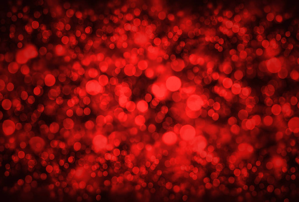 Holidays and design concept.  Abstract background. Image with blurred bokeh lights in trendy living coral color - Foto, Bild