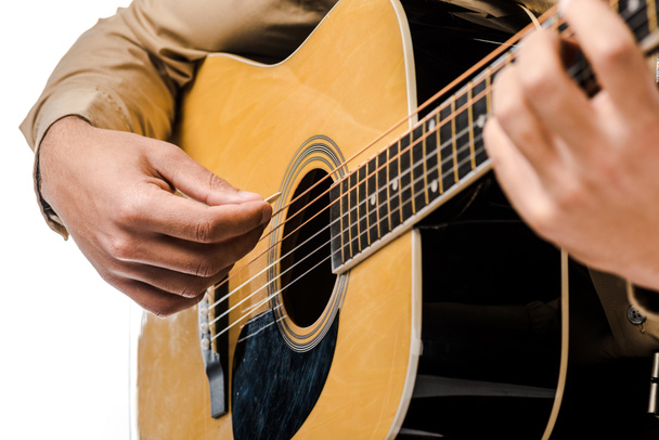cropped shot of male musician playing on acoustic guitar isolated on white - Valokuva, kuva